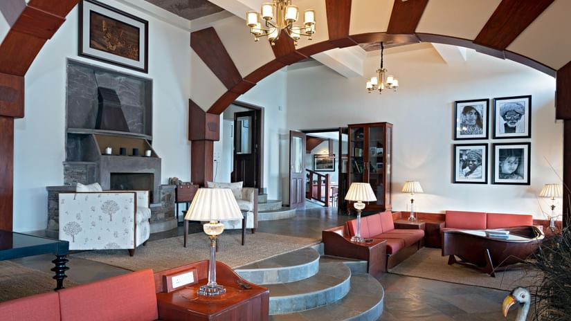 An overview of an expansive living room inside the Villa with sofas and coffee table - Chunda Shikar Oudi, Udaipur