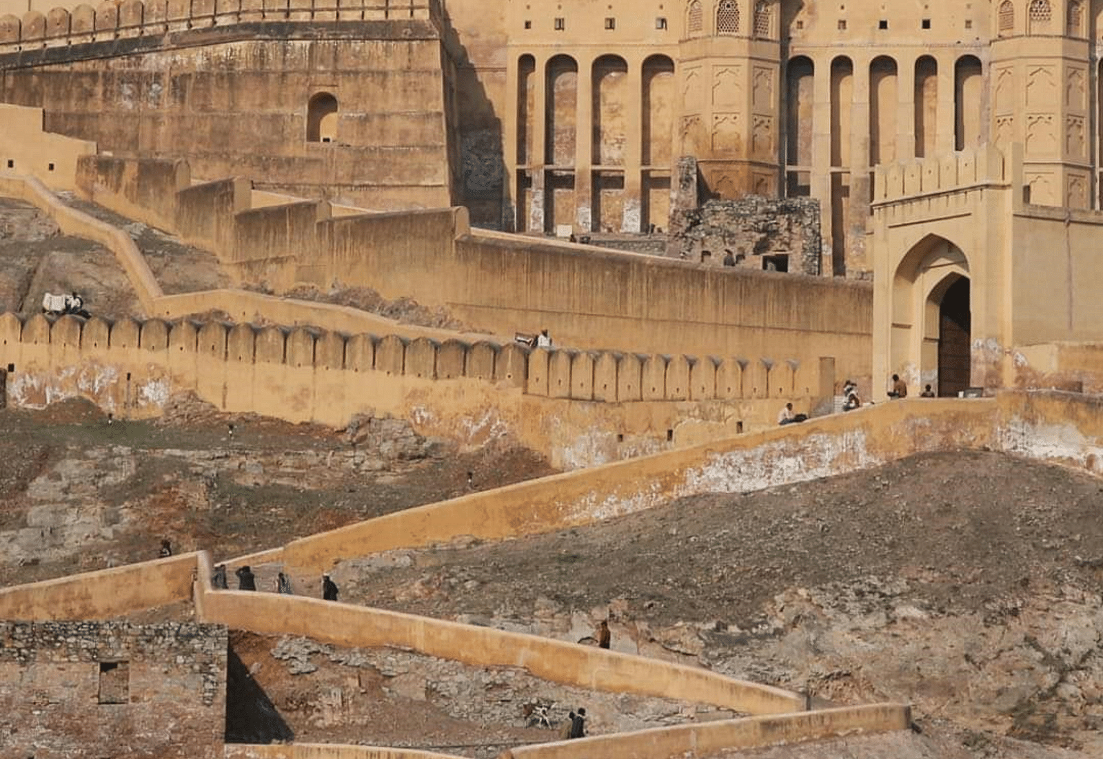 facade image of the Amer Fort in jaipur at a certain height shining bright with the sunlight