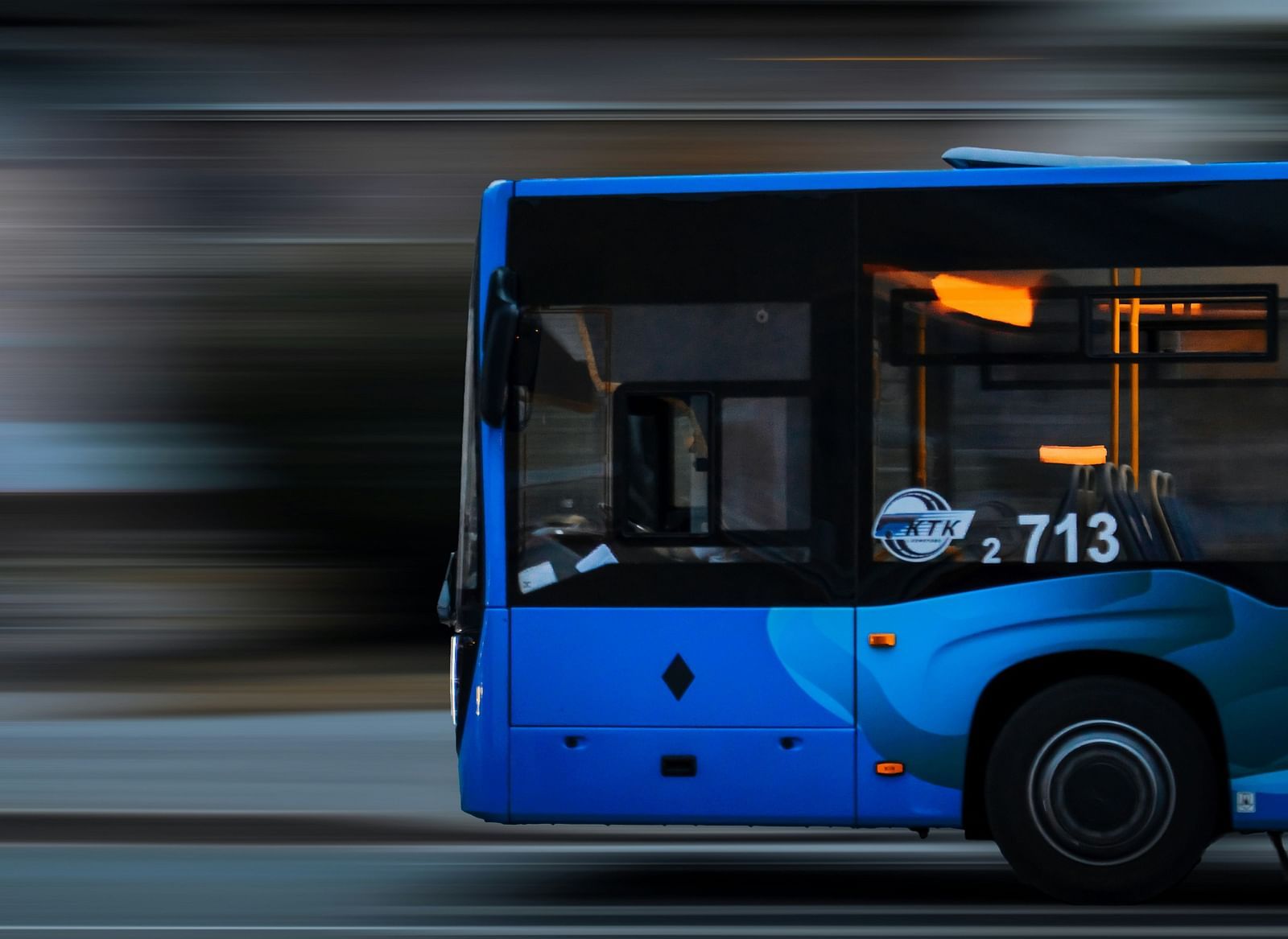 Shot of a moving bus on a busy street.