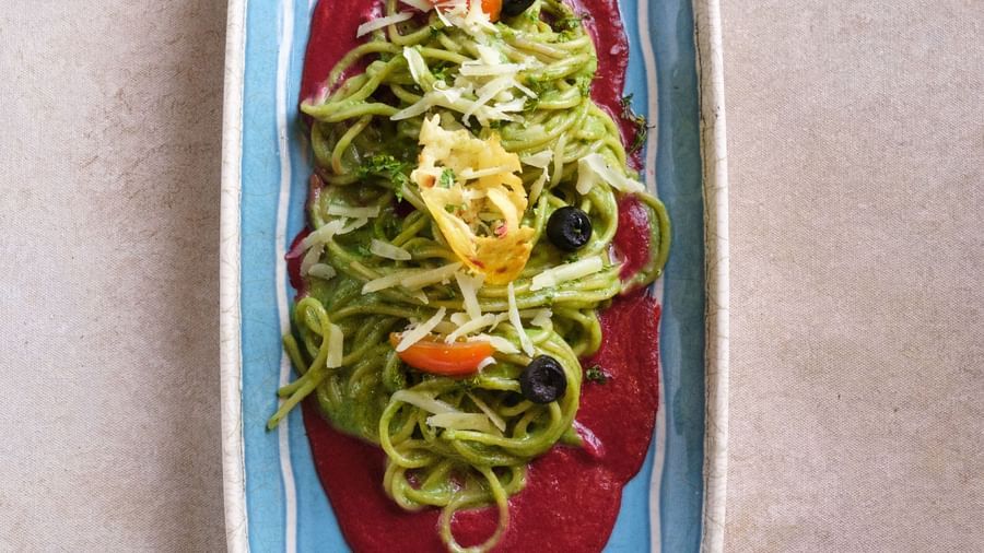 A plate of Pesto Spaghetti with Beetroot Coulis | Mango Hill, Pondicherry