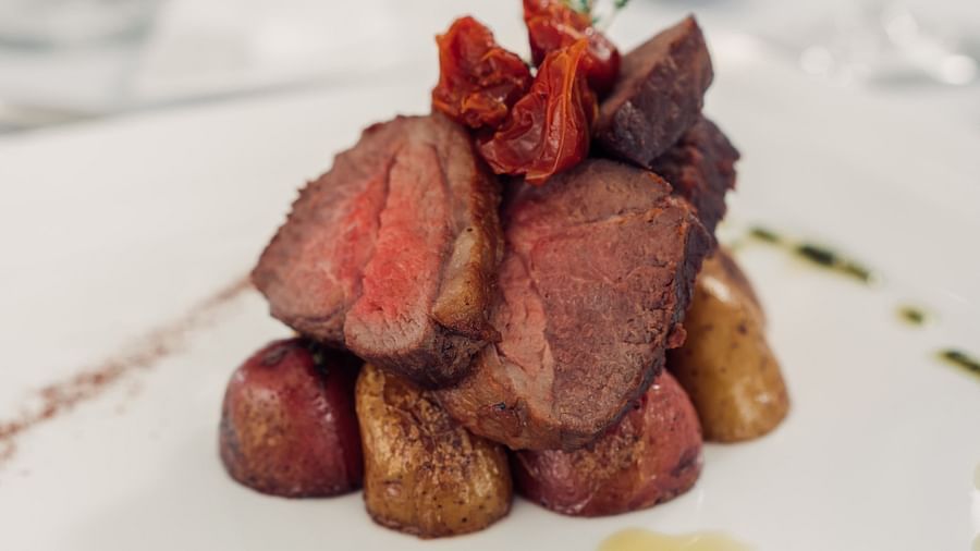 The Soco House - a plate of steak served