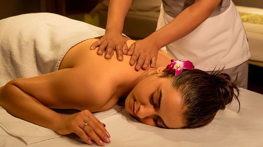 Guest enjoying a relaxing full body massage at The Dukes Retreat spa