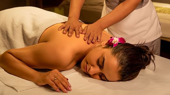 Guest enjoying a relaxing full body massage at The Dukes Retreat spa
