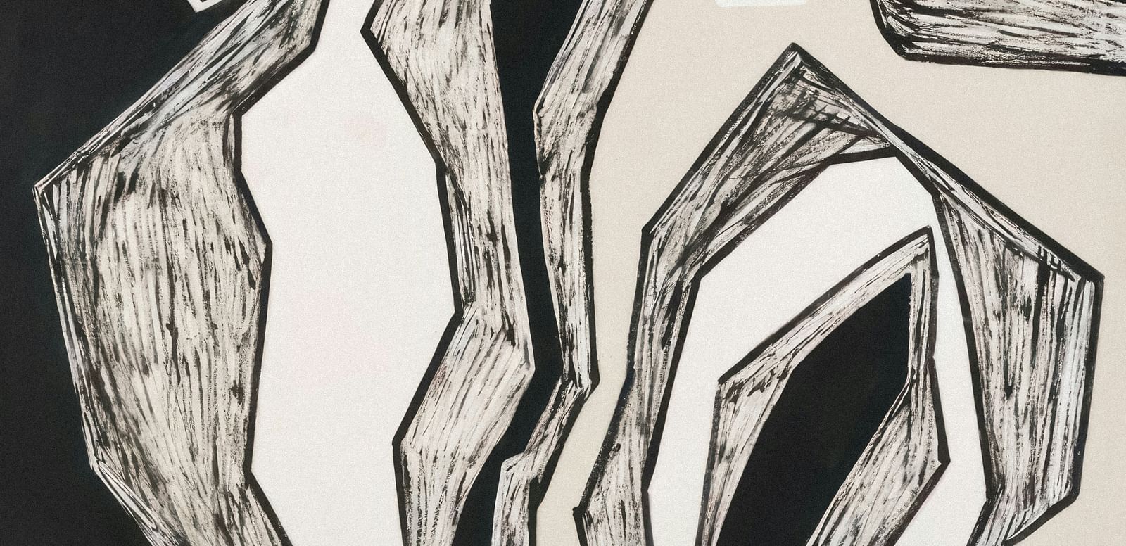 Black and white modern artwork with abstract figures.