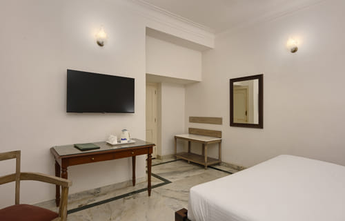 Deluxe Lake Facing Rooms desk area at Ram Pratap Palace