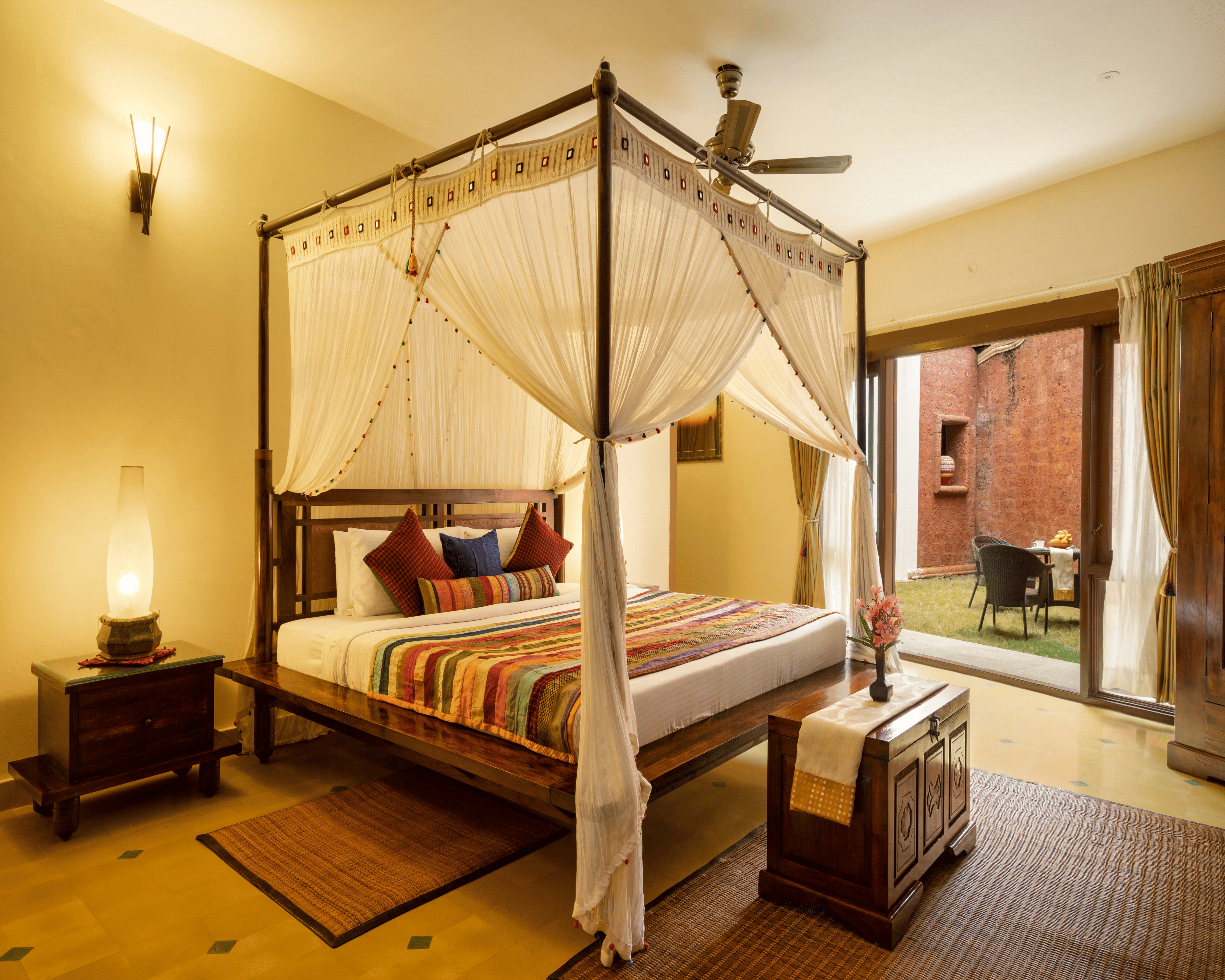 Warmly lit heritage bedroom