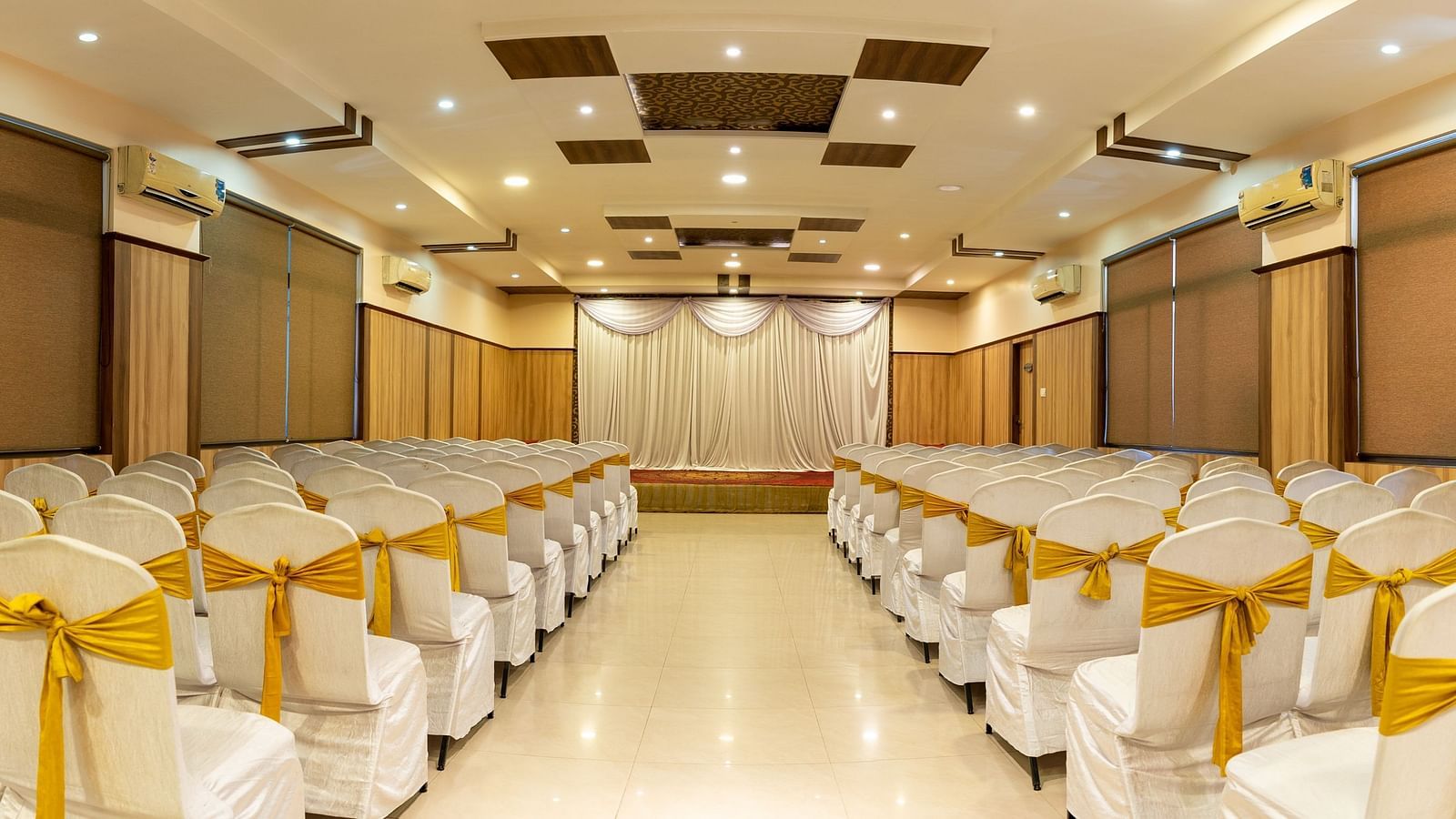 Seating arrangements inside a banquet hall - Hotel Pai Vista, KR Road