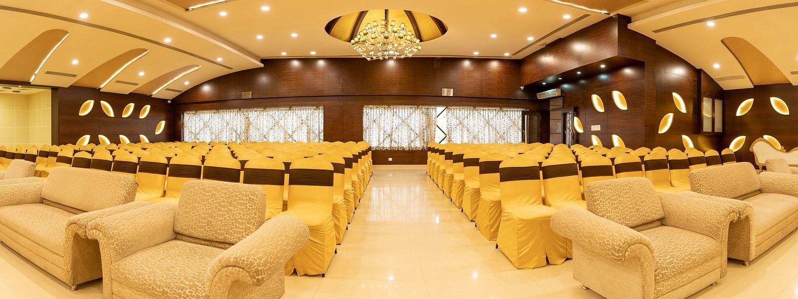 Seating arrangements inside a banquet hall - Hotel Pai Vista, KR Road