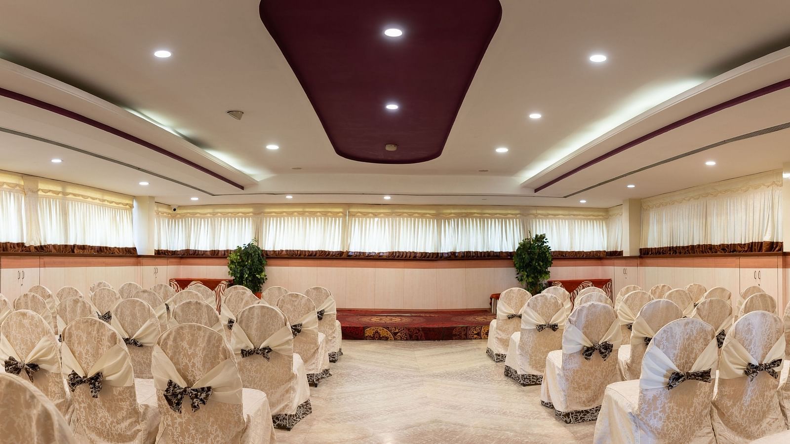 Seating arrangements inside the banquet hall - Hotel Pai Comforts, JP Nagar