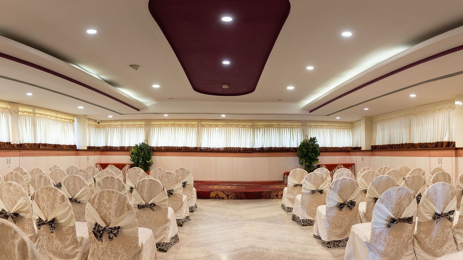 Seating arrangements inside the banquet hall - Hotel Pai Comforts, JP Nagar
