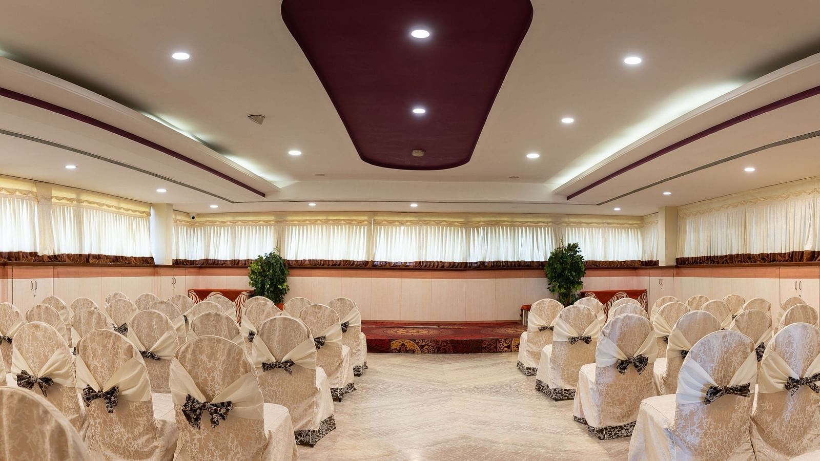 Seating arrangements inside the banquet hall - Hotel Pai Comforts, JP Nagar