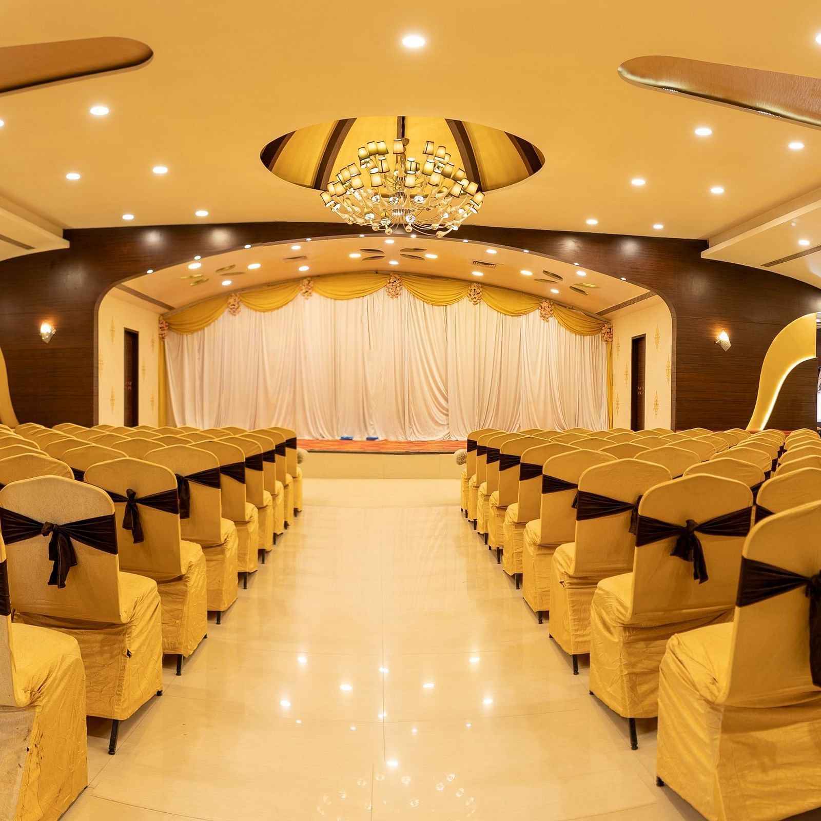 Seating arrangements inside a banquet hall - Hotel Pai Vista, KR Road