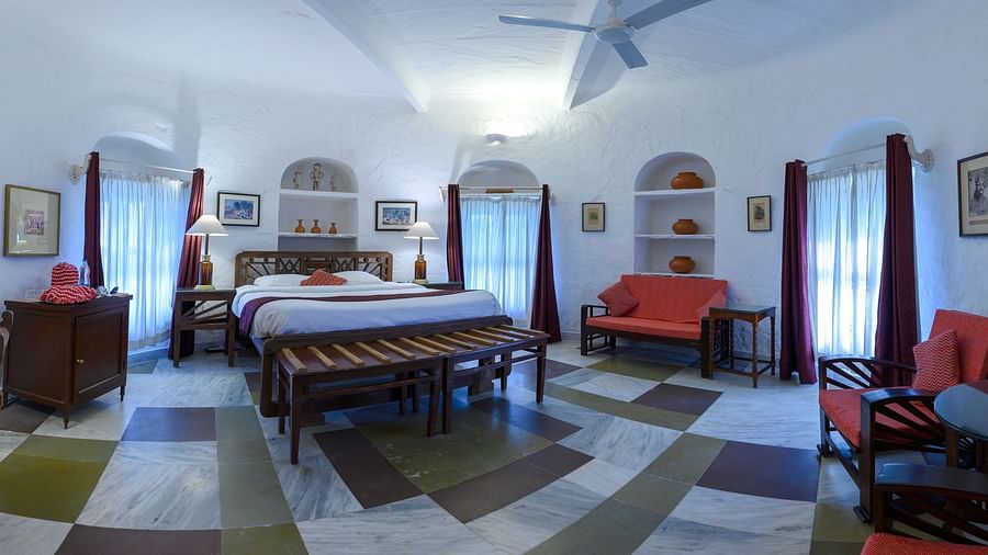 The interior of the Mubarak Mahal - Countryside View is equipped with a spacious bed and other furniture - Hill Fort-Kesroli - 14th Century, Alwar