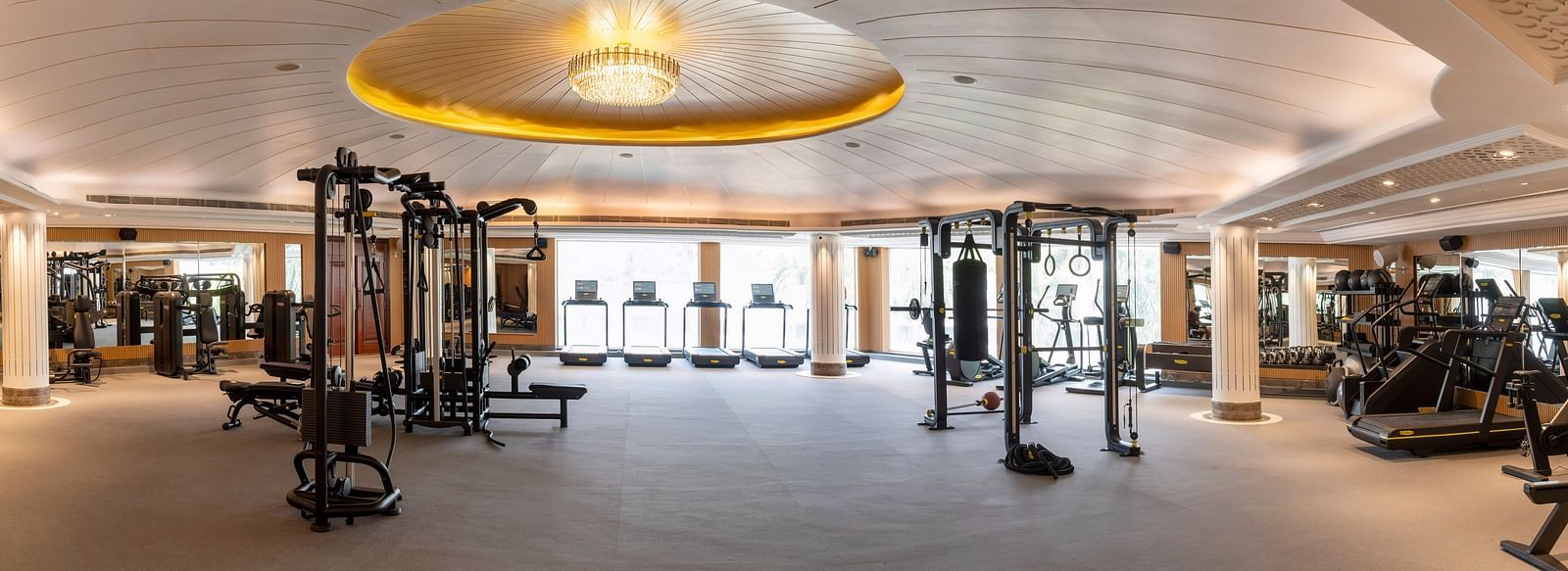 Wide angle image of the gym at The Claridges New Delhi