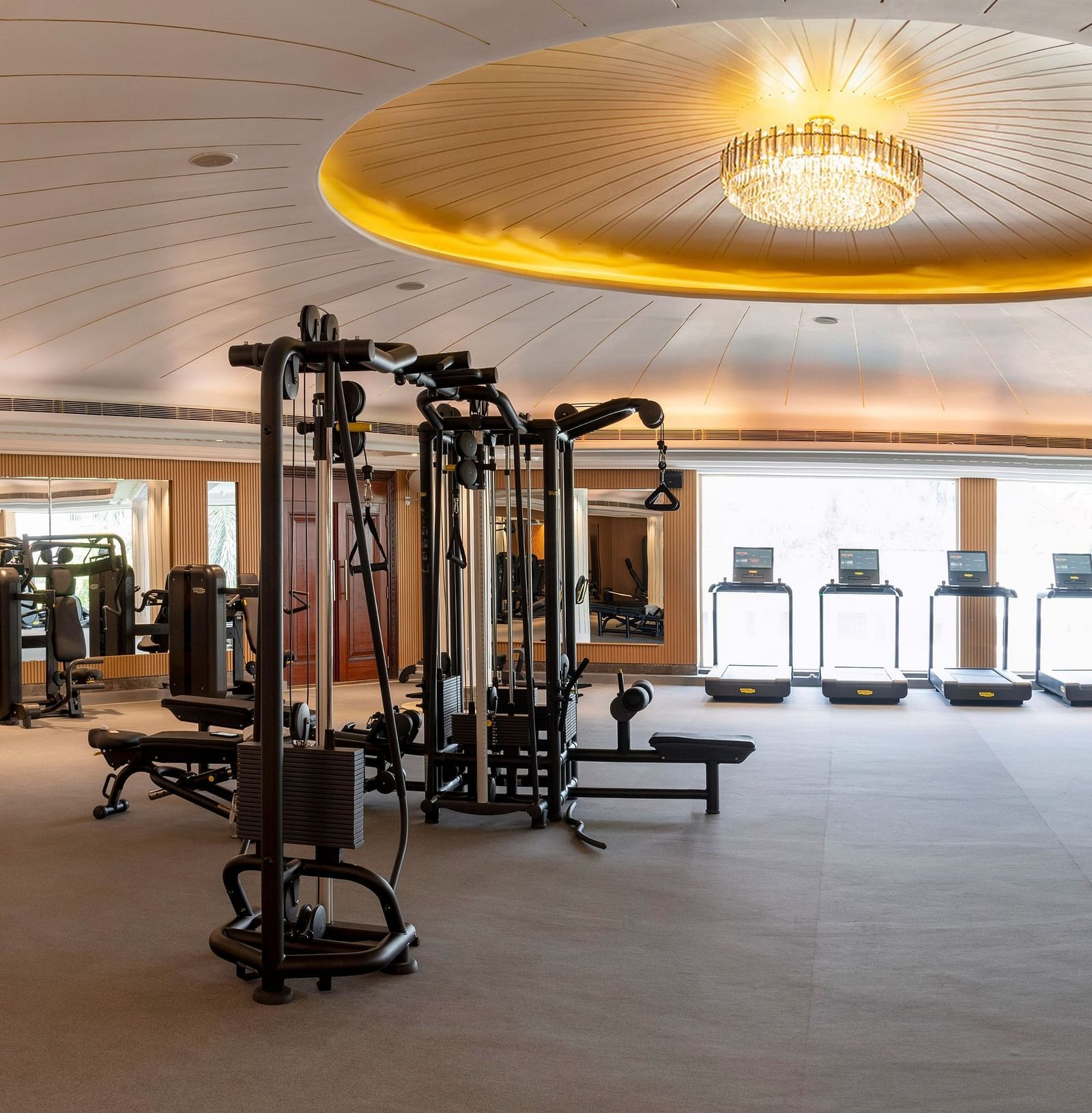 Wide angle image of the gym at The Claridges New Delhi