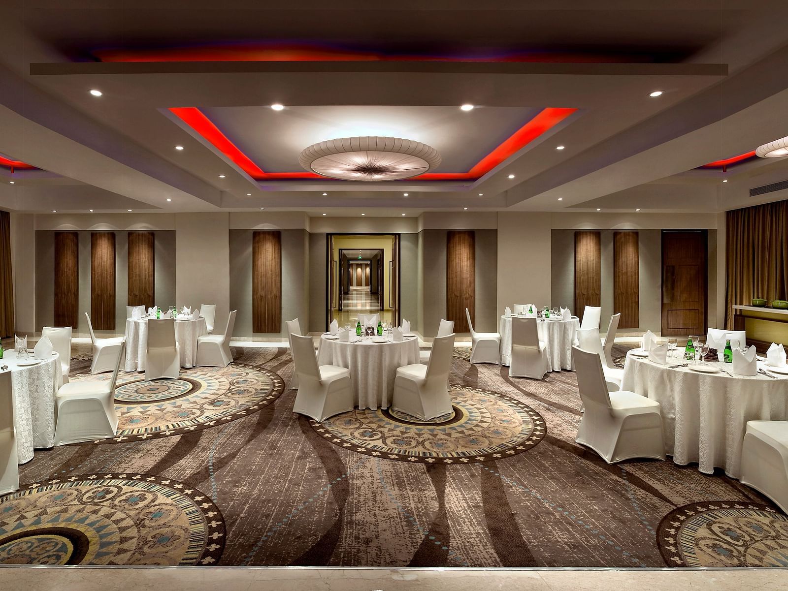 Elegantly decorated banquet hall with tables set for a formal event - The Raintree, St. Mary's Road.