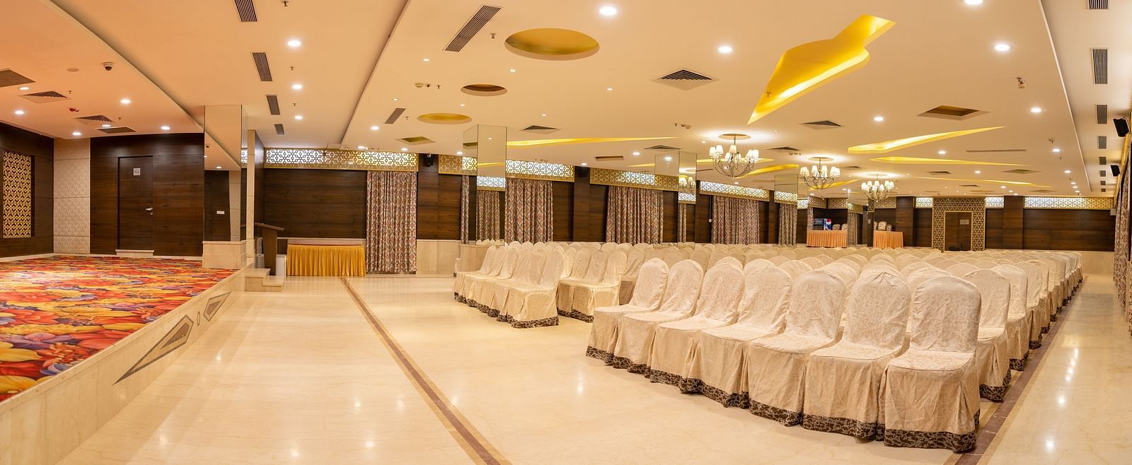 An image of the Sammilan Hall at The President Hotel, Hubli