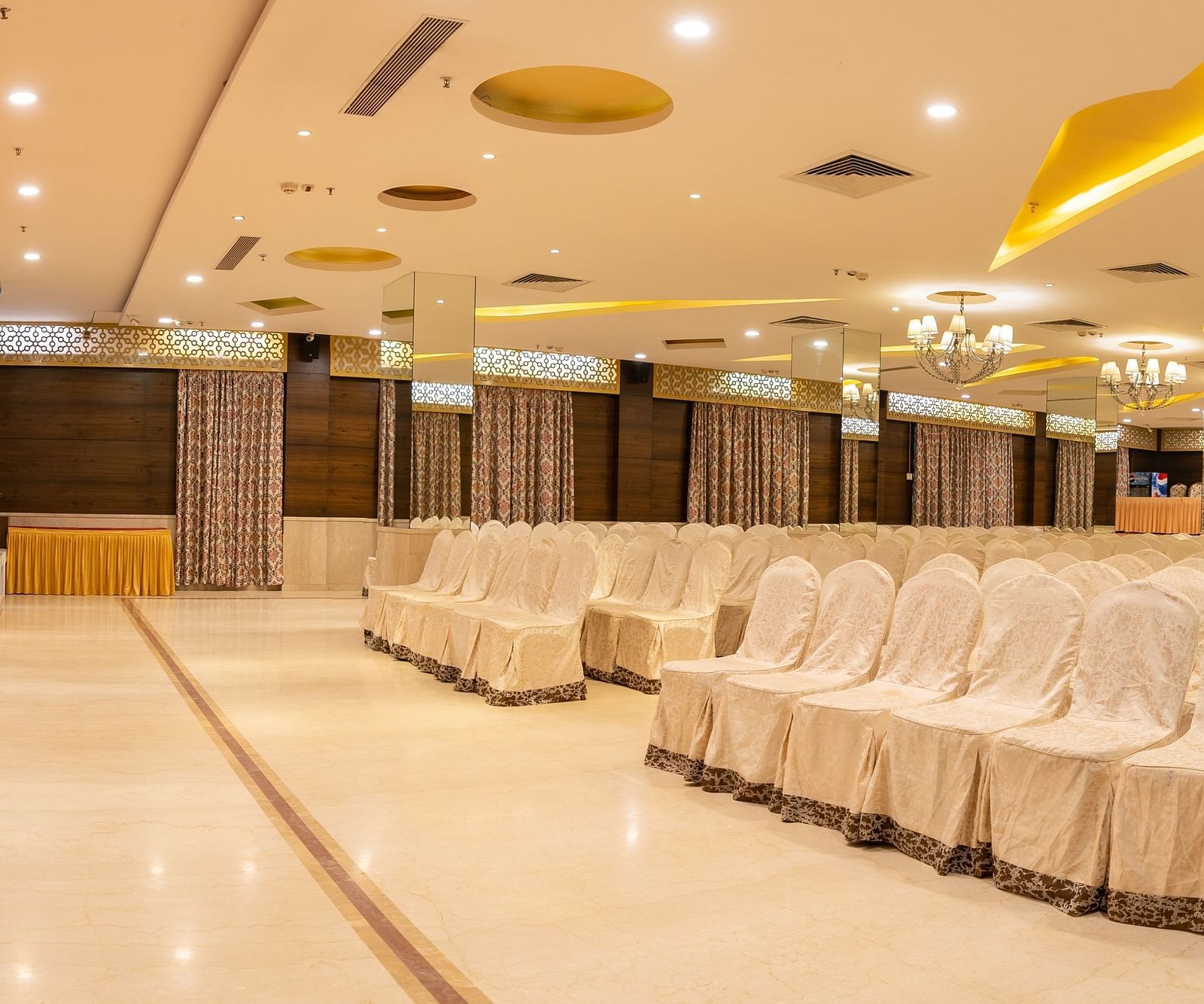 An image of the Sammilan Hall at The President Hotel, Hubli