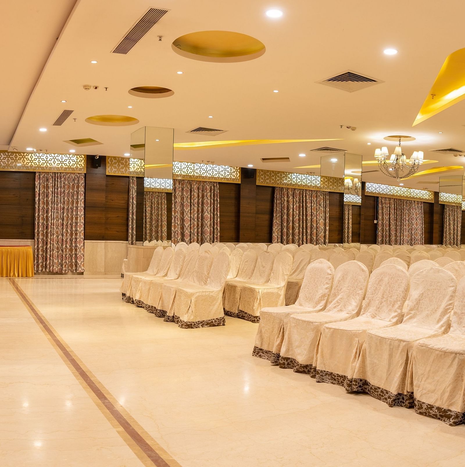 An image of the Sammilan Hall at The President Hotel, Hubli