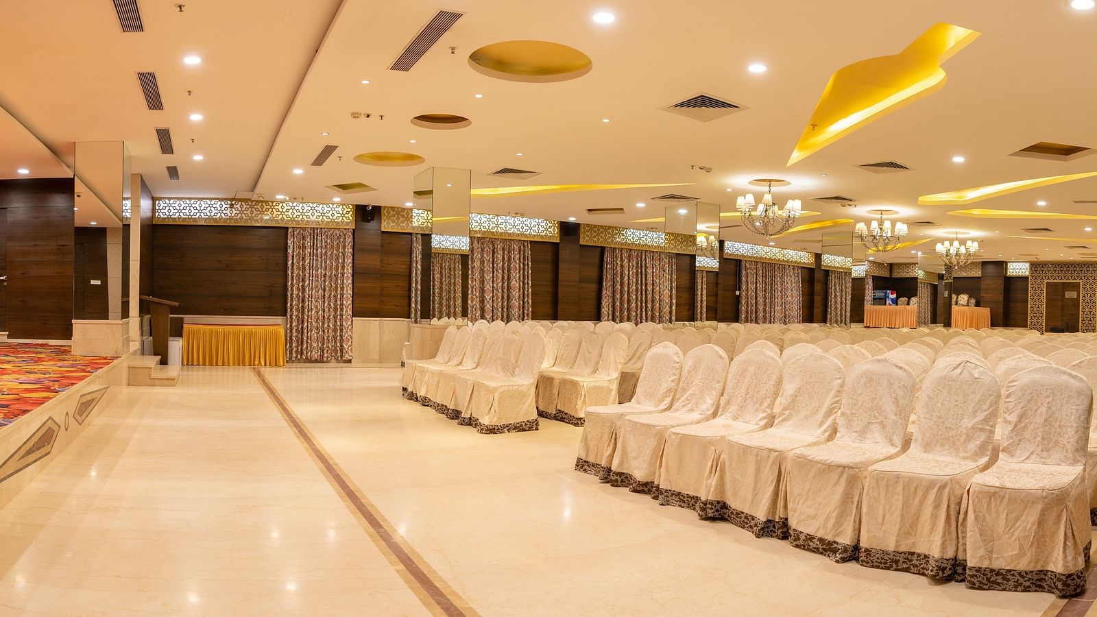 An image of the Sammilan Hall at The President Hotel, Hubli