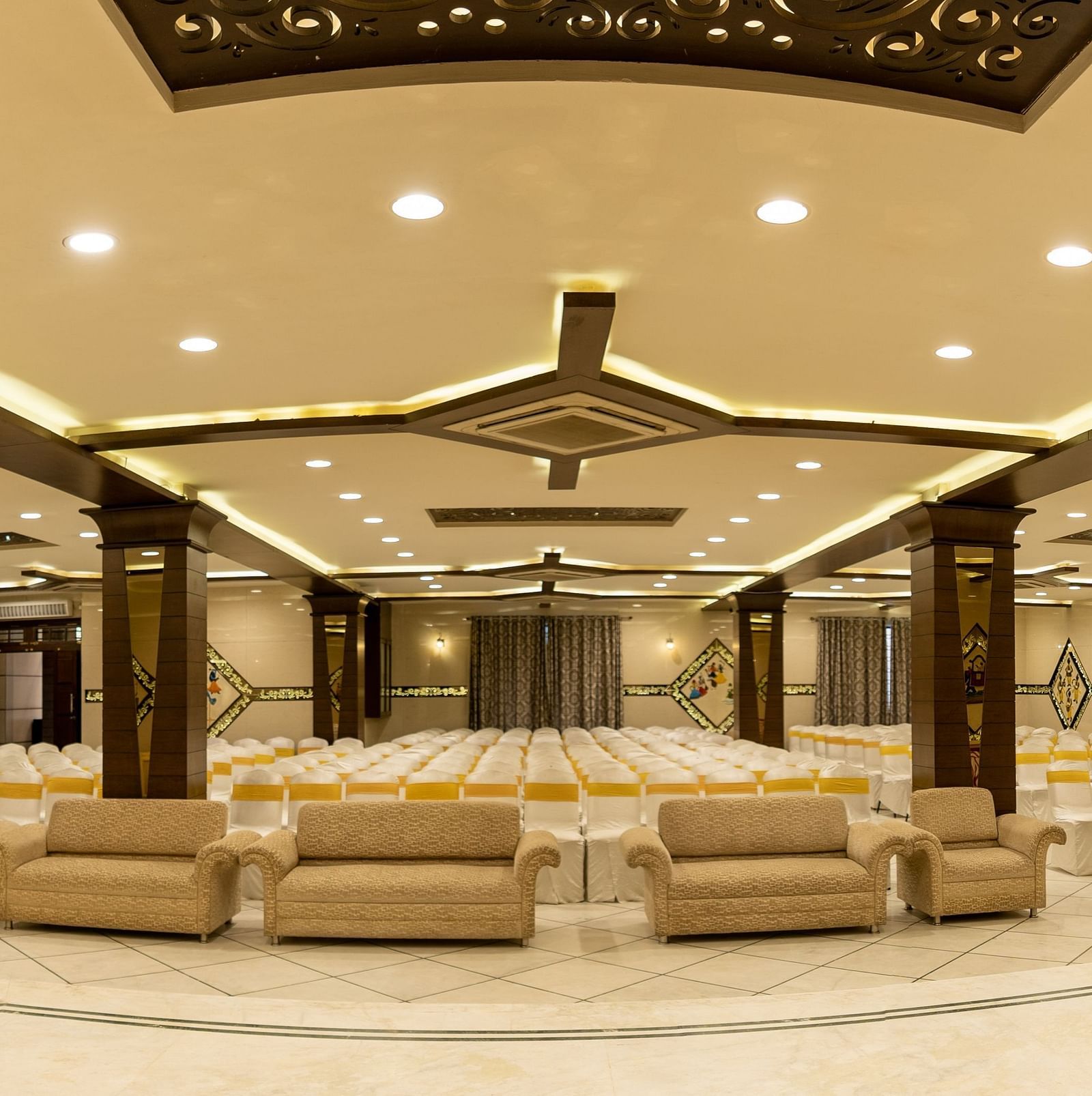 Seating arrangements inside a banquet hall - Hotel Pai Vista, KR Road