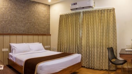 A well appointed hotel room with all the necessary amenities for a relaxing stay.