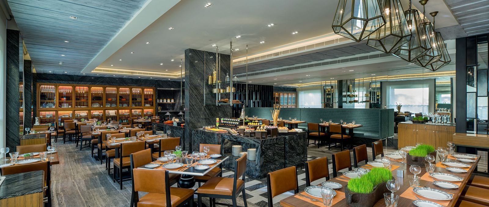 Image of a restaurant  at The Raintree St. Mary s Road with chairs and tables