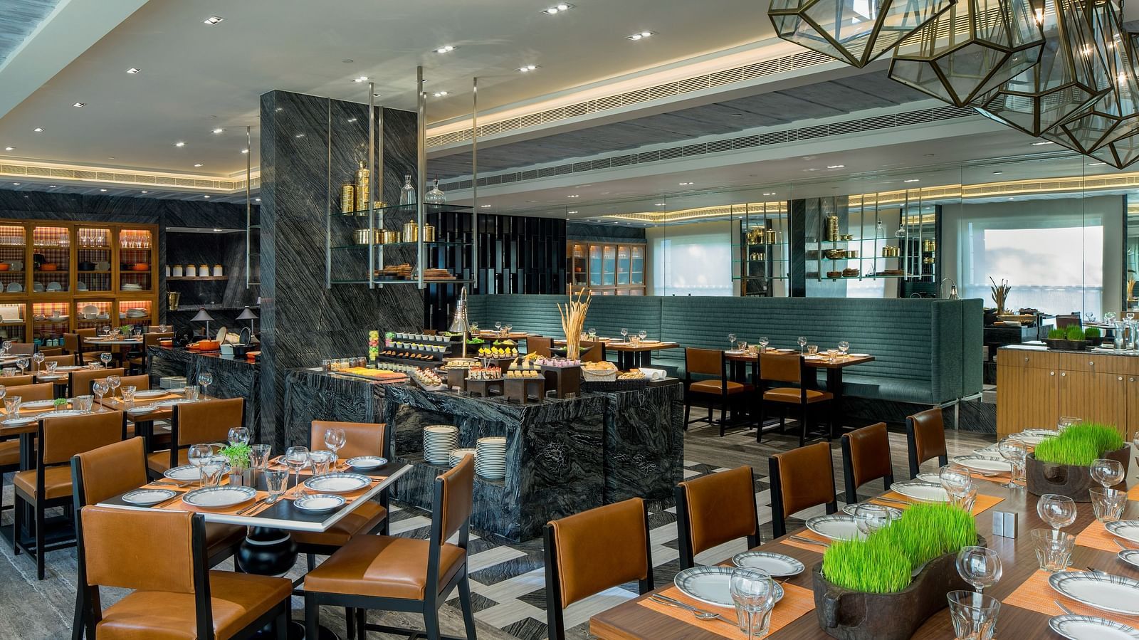 Image of a restaurant  at The Raintree St. Mary s Road with chairs and tables