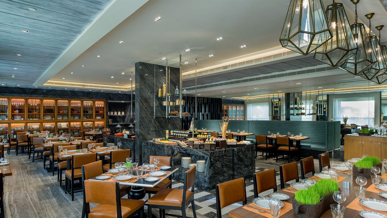 Image of a restaurant  at The Raintree St. Mary s Road with chairs and tables