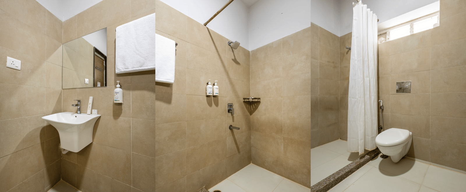 Multiple angles of the bathroom of 4BHK showcasing its bathroom and shower fittings, western commode, sink, and wall-mounted mirror.