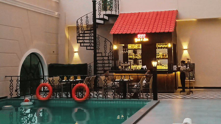 swimming pool and poolside dining area  - Hotel Polo Towers, Agartala