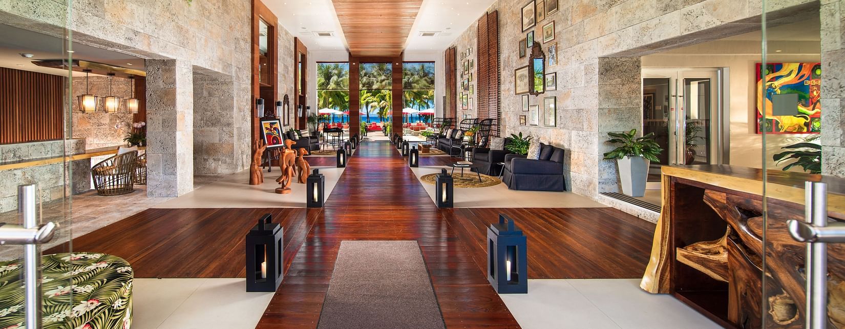 A hotel lobby with cosy seating arrangement and ambient lighting - S Hotel Montego Bay, Jamaica