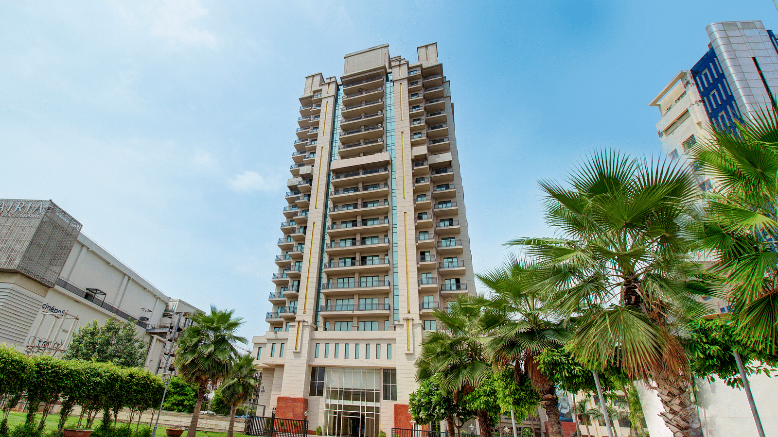 Facade view of the Entrance with trees at Rhythm Gurugram