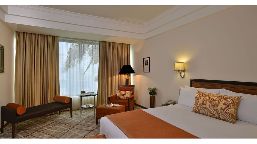 Deluxe suite bedroom at Hotel Marine Plaza Mumbai