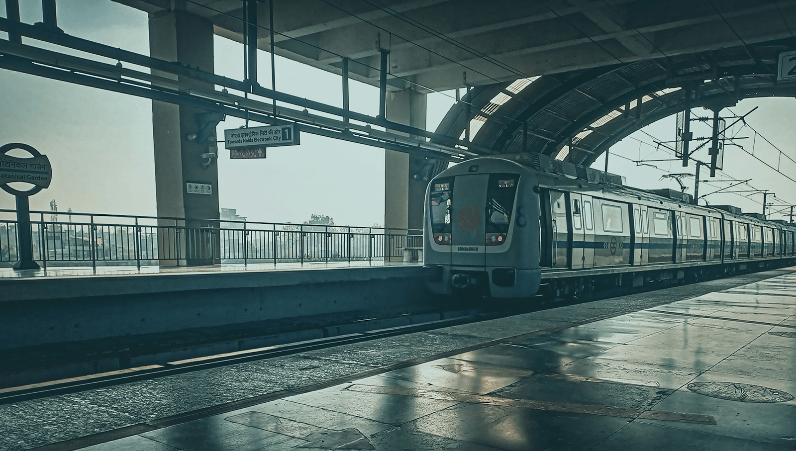 A metro passing by in a metro station.