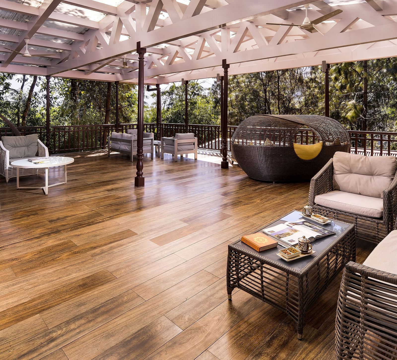 the yoga deck with sofa sets on one side -  Mayfair Spa Resort & Casino Gangtok 