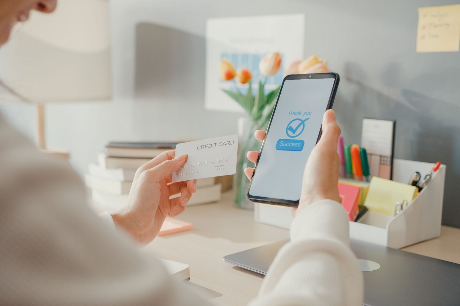 closeup-young-lady-use-cellphone-order-online-shopping-product-pay-bills-with-credit-card-living-room-interior-house