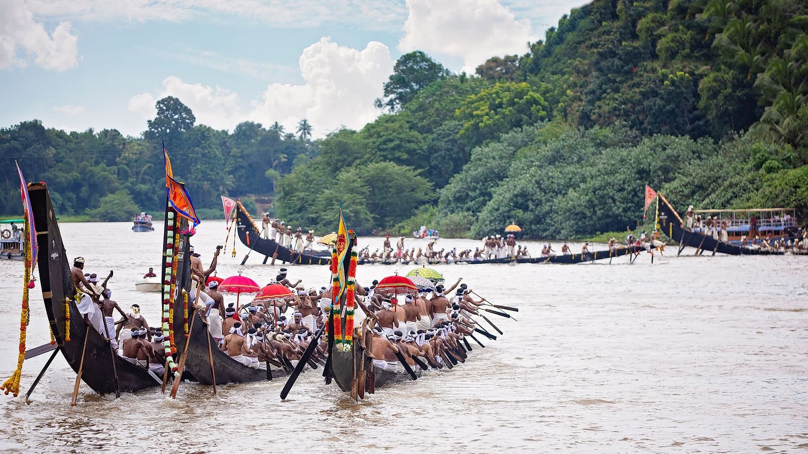 an image of People participating in Vallam Kali
