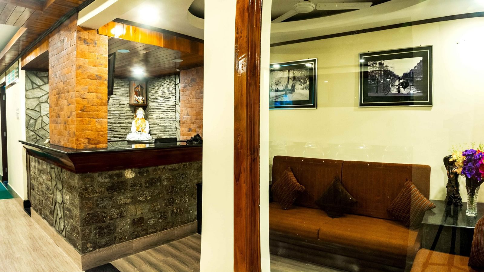 An image of the lobby at Ecotel Tin Tin, Bijanbari with a waiting area and the reception desk