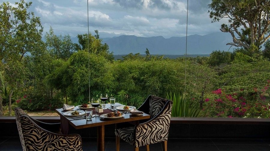 outdoor dining with a great view at our resort in Bandipur - The serai Bandipur