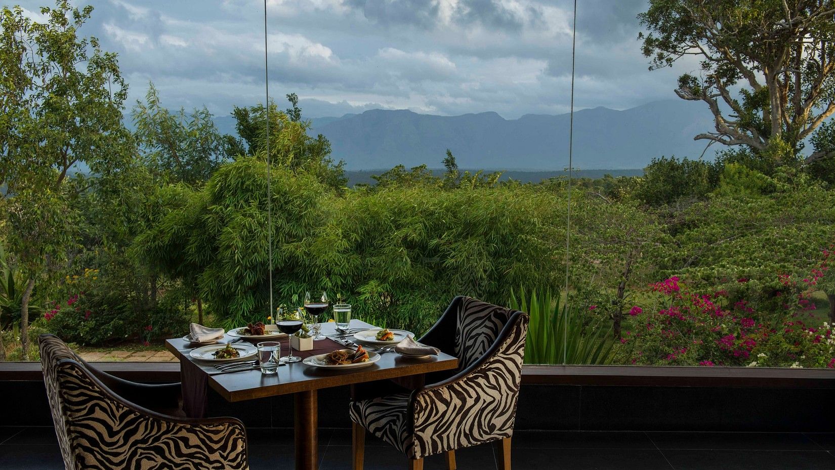 outdoor dining with a great view at our resort in Bandipur - The serai Bandipur
