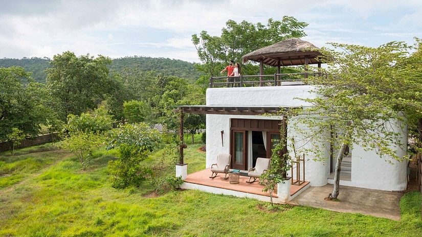 exterior facade of The Residence surrounded by greenery at The Serai Bandipur