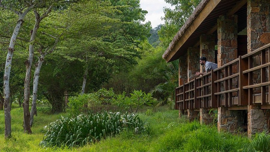 person leaning out of balcony of Mountain View Courtyard Superior - The serai bandipur