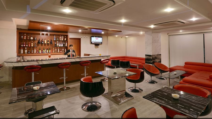 Image of Float Bar with chairs and tables and a bar section