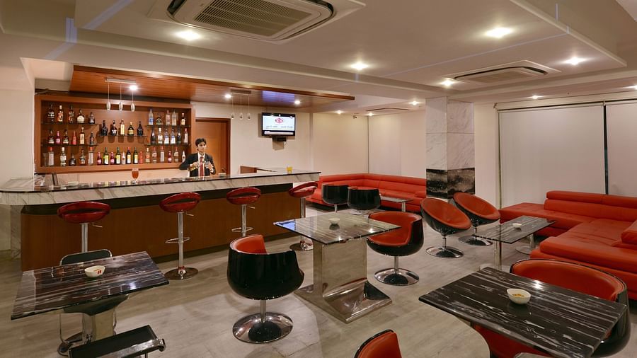 Image of Float Bar with chairs and tables and a bar section