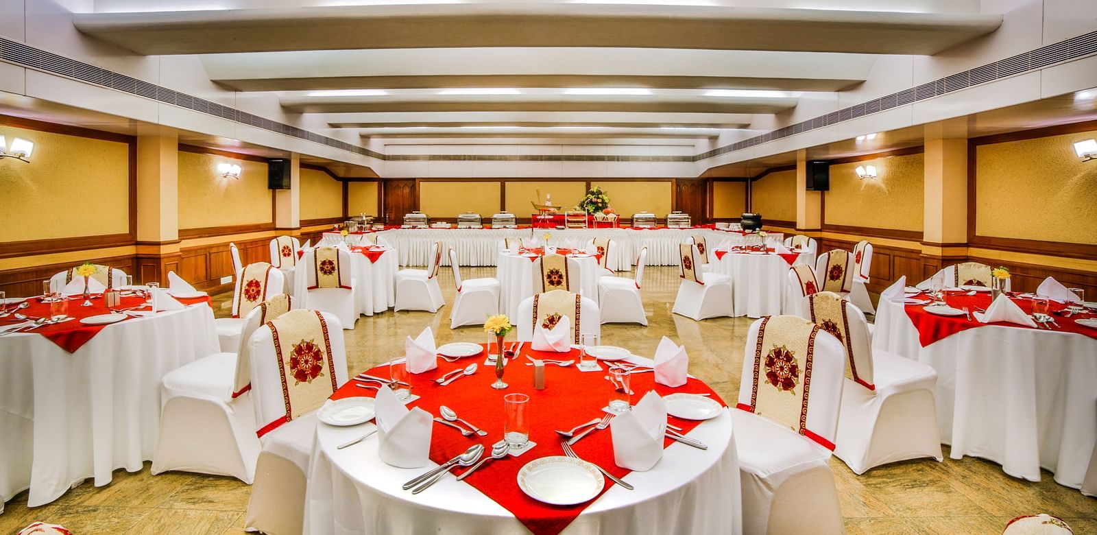 Round table with red table cloth set up at our banquet hall at Tara, Comfort Hotel in Hyderabad - Ramoji Film City.