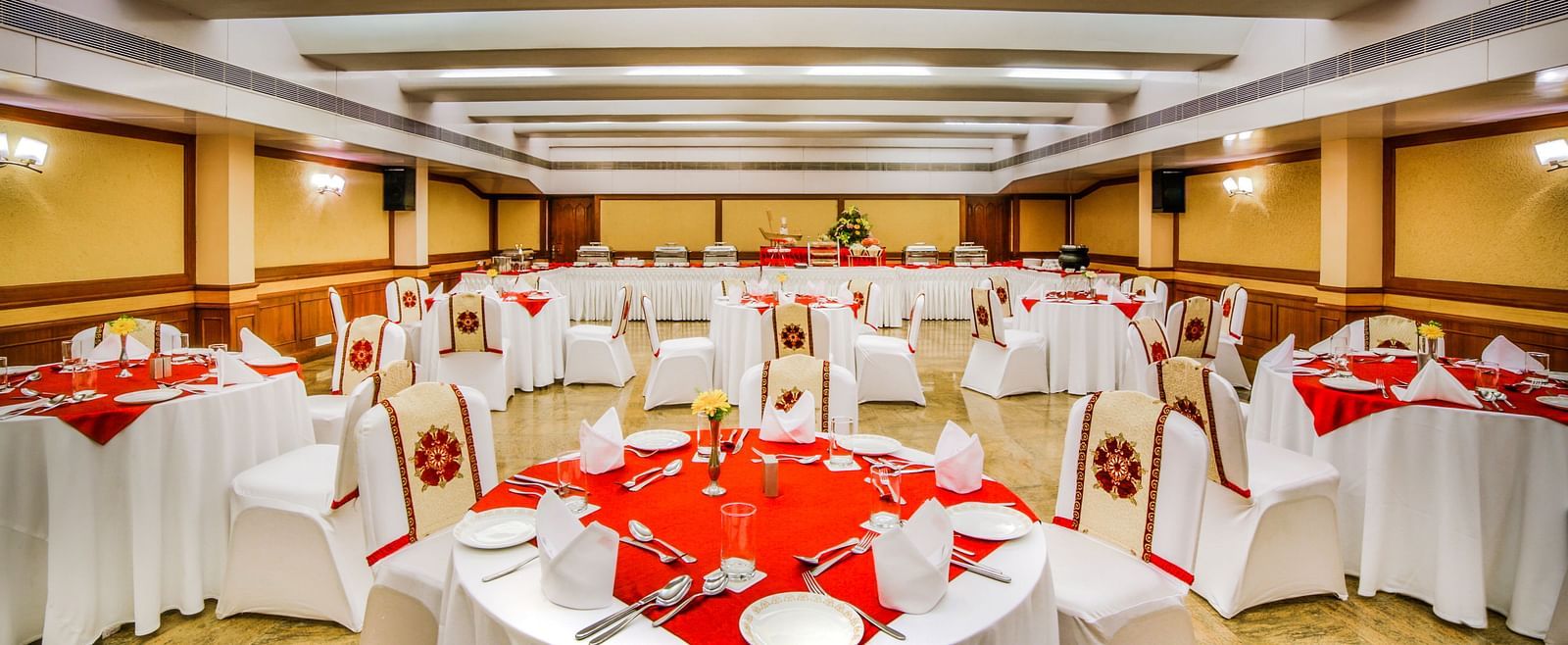 Round table with red table cloth set up at our banquet hall at Tara, Comfort Hotel in Hyderabad - Ramoji Film City.