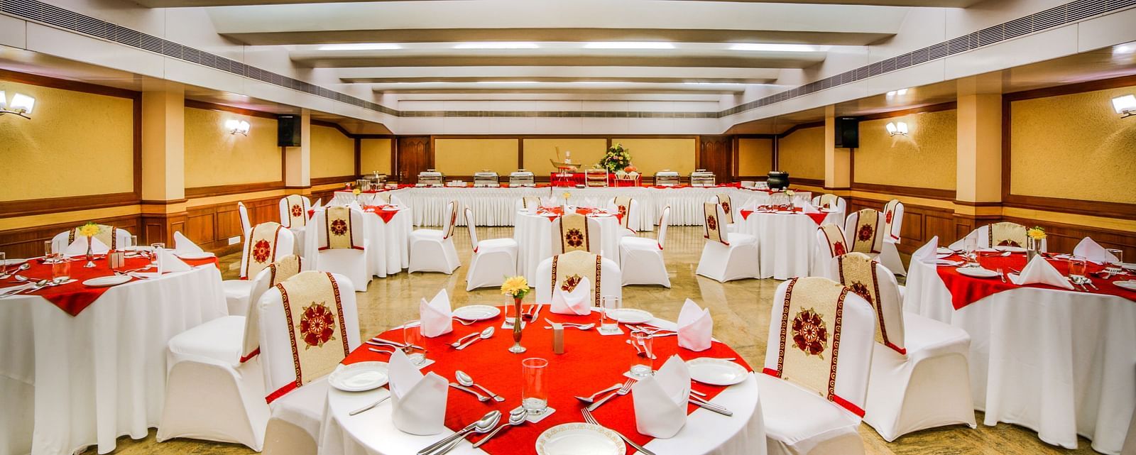 Round table with red table cloth set up at our banquet hall at Tara, Comfort Hotel in Hyderabad - Ramoji Film City.