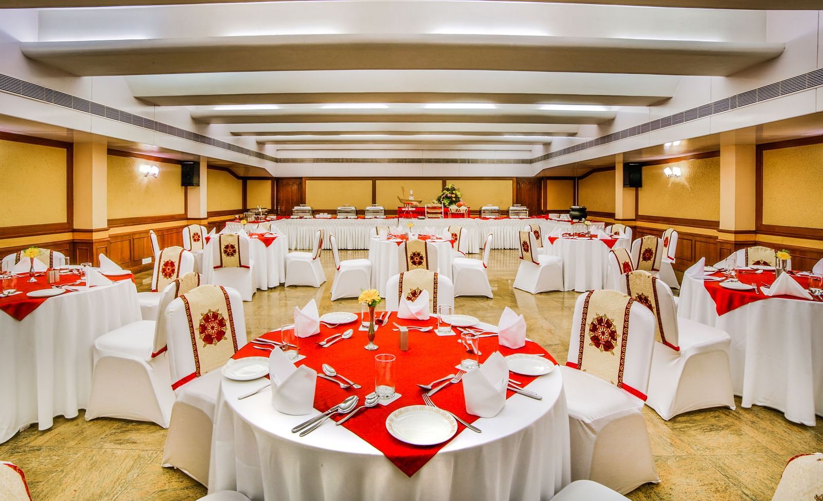 Round table with red table cloth set up at our banquet hall at Tara, Comfort Hotel in Hyderabad - Ramoji Film City.