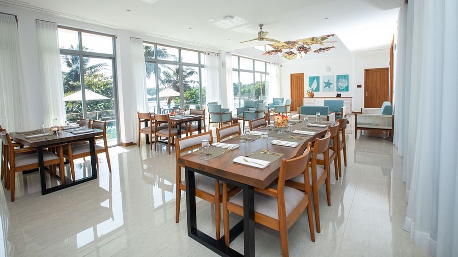 image of the bright dining area for the guests at the beacon by the bay villas& suites in dondra